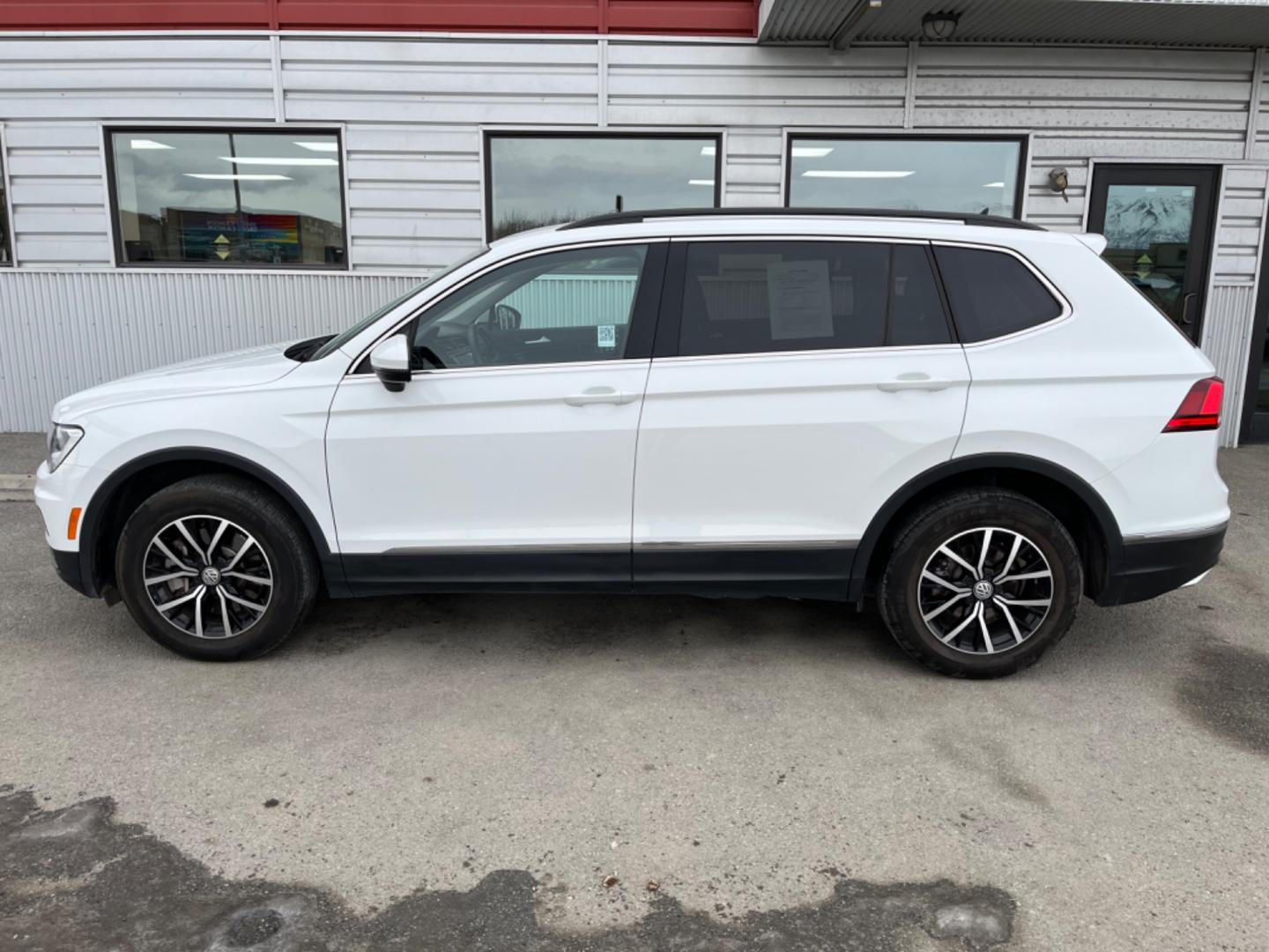 2021 White Volkswagen Tiguan SE 4Motion AWD (3VV2B7AX9MM) with an 2.0L L4 DOHC 16V TURBO engine, 8A transmission, located at 1960 Industrial Drive, Wasilla, 99654, (907) 274-2277, 61.573475, -149.400146 - Photo#2